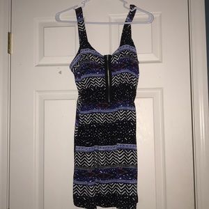 Summer slip on dress with a fake zipper on front.